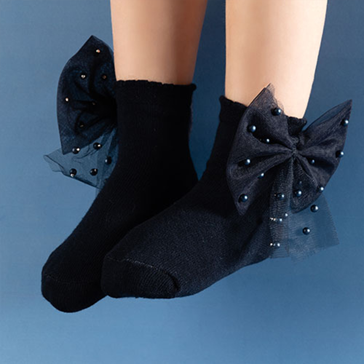 גרב פפיון ופנינים